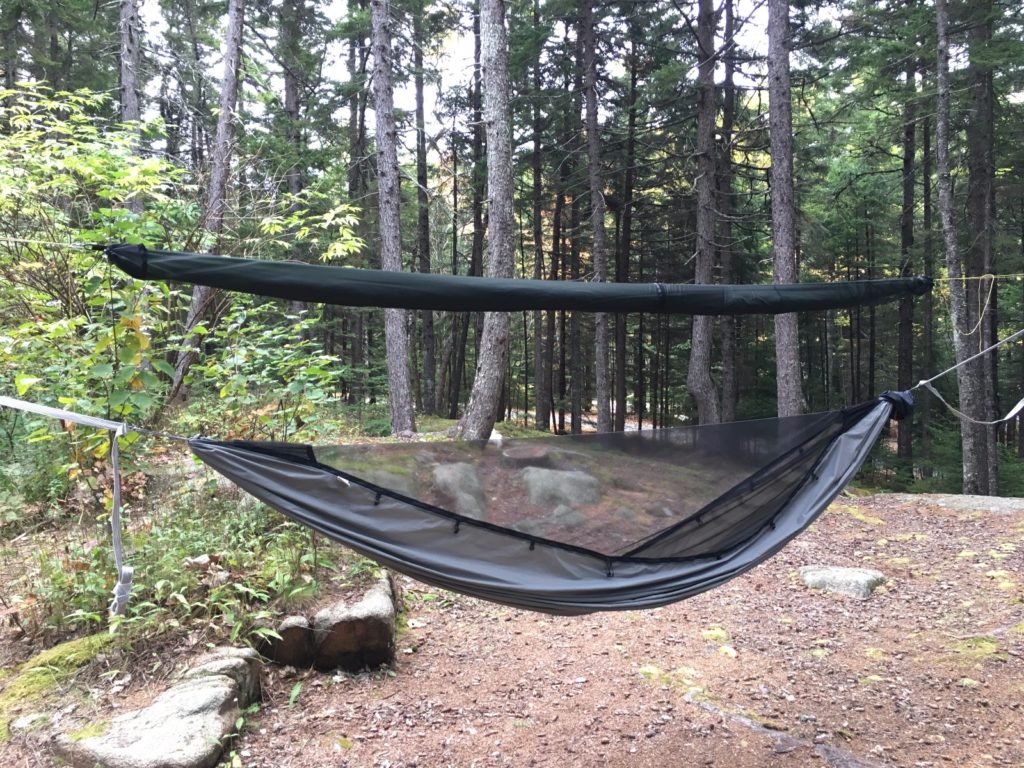 12′ 6″ Tarp Sleeve hung above a hammock in the woods