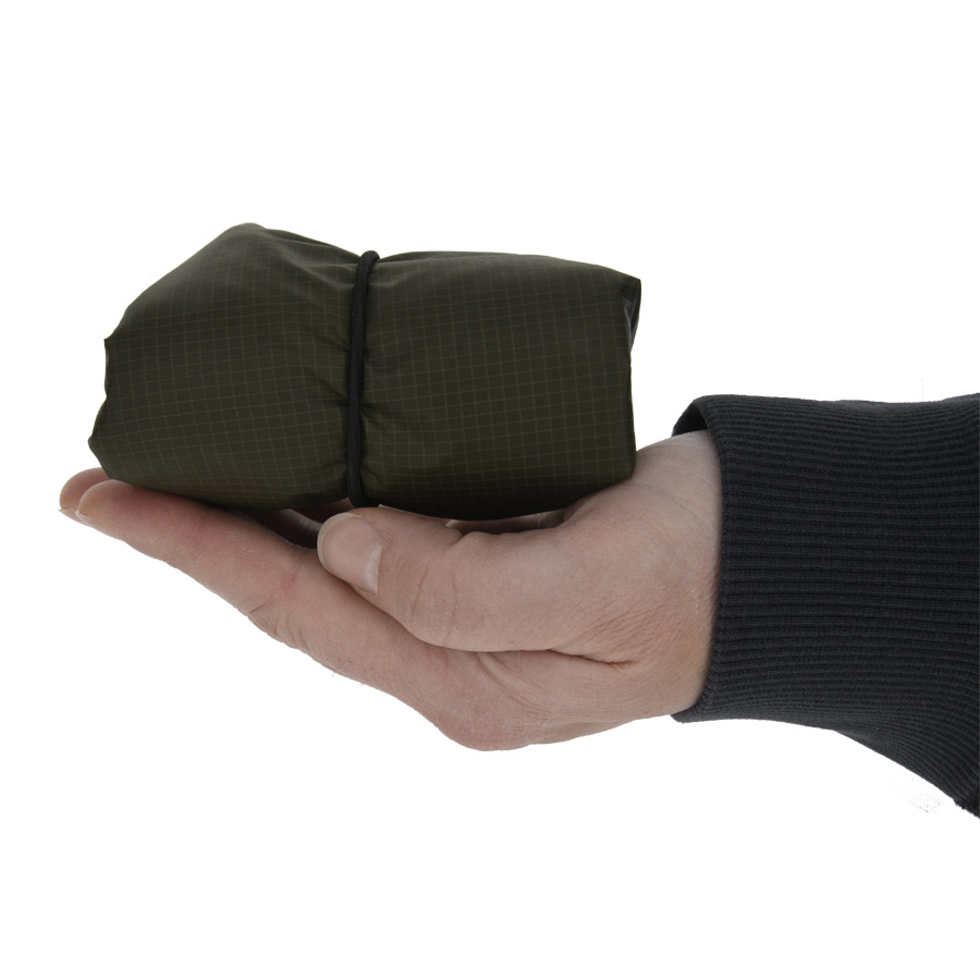 green garment bag in palm of hand