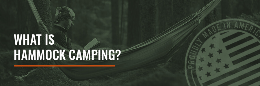 a man laying in a camping hammock